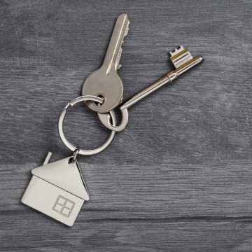 Two keys on a house key ring